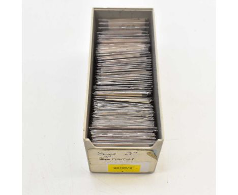 A coin box containing approximately seventy coin wallets, containing silver and half-silver threepence coins.Condition Report