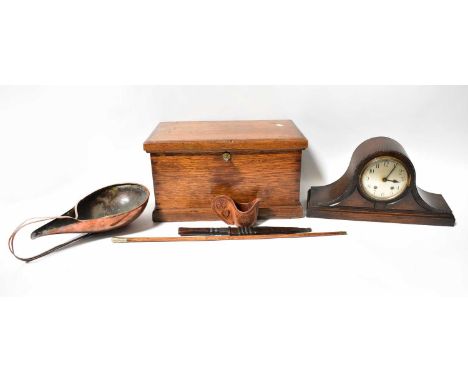 An oak twin-handled small rectangular chest, width 48.5cm, an oak domed top mantel clock, copper pan, knife and swagger stick