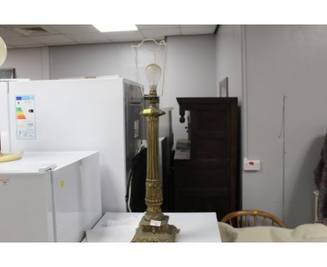 A brass column table lamp 