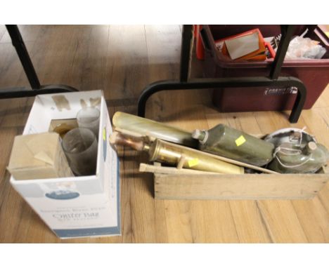 A wooden box of vintage green bottles, shoehorn etc and a box of glassware