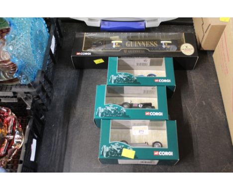 A Corgi dicast Guinness lorry together with three Corgi model racing cars