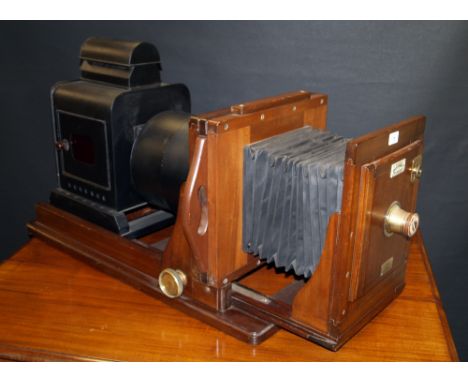 A Hunter-Penrose Ltd. mahogany and tin magic lantern of large proportions
