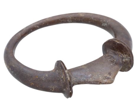 Celtic, a bronze oval terret ring, 1st century AD, 5cm wide by 5.8cm high; circular in section expanding at the sides ending 