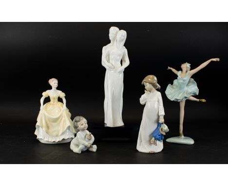 A Collection Of Ceramic Figures Five in total to include two Nao figures the first in the form of a seated boy with bottle, s