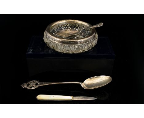 A Small Collection Of Silver Items To include mother of pearl handle fruit knife, small caddy spoon, souvenir spoon, and silv