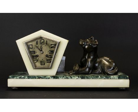 Art Deco Marble Figural Mantle Clock Raised on rectangular base of cream and moss green veined Verdi marble, the clock is cas