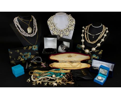 A Mixed Collection Of Costume Jewellery Comprising pendants, cufflinks, faux pearl fringe statement necklace, bracelets, vari