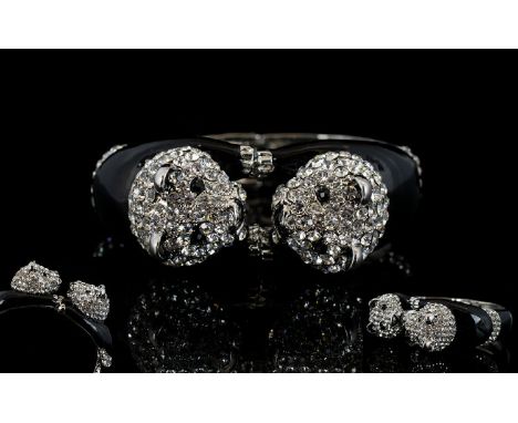 White Crystal and Black Enamel Double Panda Bangle, a hinged bangle, opening where the two crystal and enamel pandas face eac