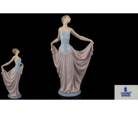 Lladro Special Edition Porclain Lady Figurine, elegant ladies figure 'Dancer' dressed in a flowing pastel blue and pink dress