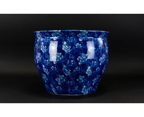 A Large Ceramic Planter The whole, transfer printed in blue and white floral and scroll repeat. Good condition, height, 11 in