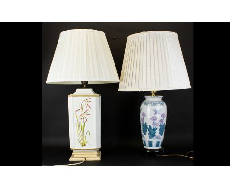 An Italian Sectional Ceramic Table Lamp with painted floral decoration , cream ground with cream pleated shade. Together with