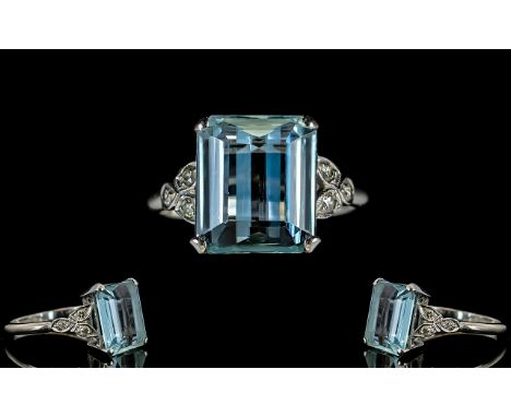 Platinum Set Aquamarine And Diamond Ring Set with a large faceted emerald cut aquamarine of wonderful colour and clarity in p