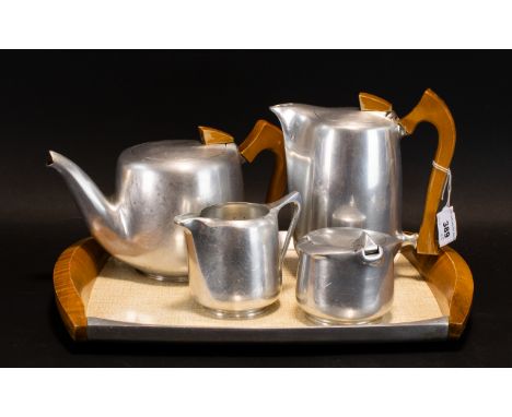 Picquot Ware Mid Century Tea And Coffee Set  Five piece set of typical form in stainless steel, formica and wood, comprising 