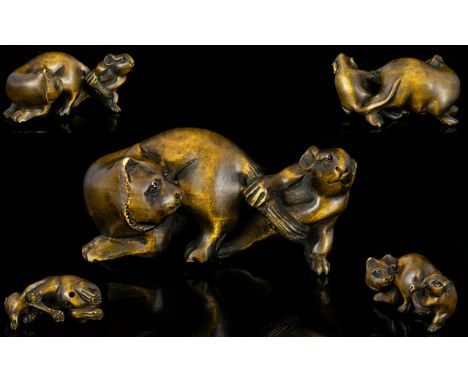 Japanese Superb Quality Signed Carved Boxwood Netsuke in the form of a cat and mouse circa Meiji period 1867-1912, please see