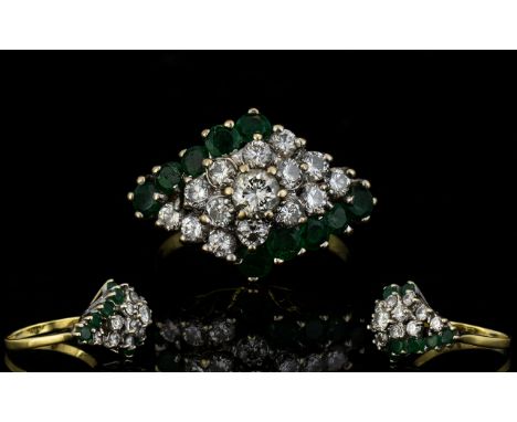 18ct Gold Attractive 1970's Emerald Cluster Ring flowerhead design. The diamonds of good colour and clarity. Est diamond weig