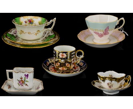 A Mixed Collection Of Antique And Vintage Teacups Five items in total to include continental demitasse and saucer of square f