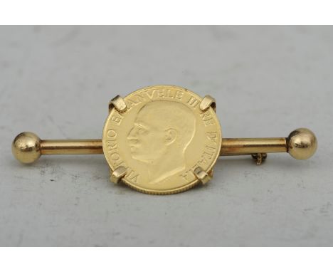 Münzbrosche, 18k Gelbgoldfassung mit Öffnungsmechanismus (Länge ca. 5,5 cm, ca. 4,5 gr.), eingefasste "20 Lire" aus den 1920e