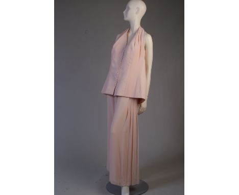A 'Christian Dior haute Couture Paris' Ensemble Size 16/18.  A pair of soft pink silk chiffon culottes, pintucked and pleated