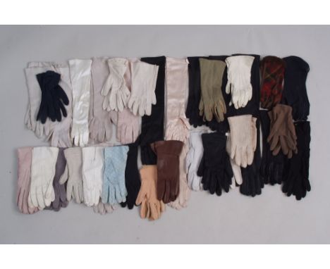 A Large Quantity of Vintage Evening Gloves.  To include a pair of arm length black gloves, 6 pairs of elbow length gloves and