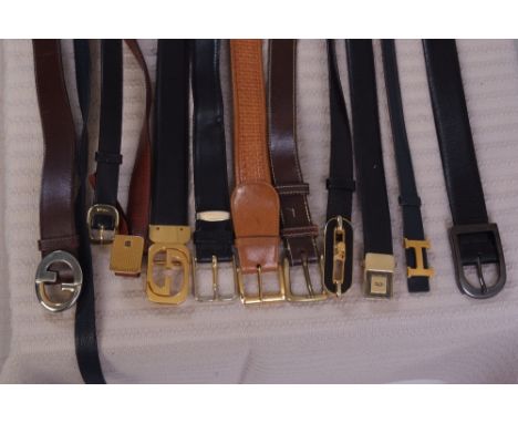 A collection of Hermes & Gucci Belts. To include a Hermes leather belt, three Gucci leather belts, a Celine Paris belt, a Fer