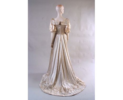 1903 Wedding Gown embroidered by the Royal School of Needlework.   This very beautiful soft satin wedding gown was originally