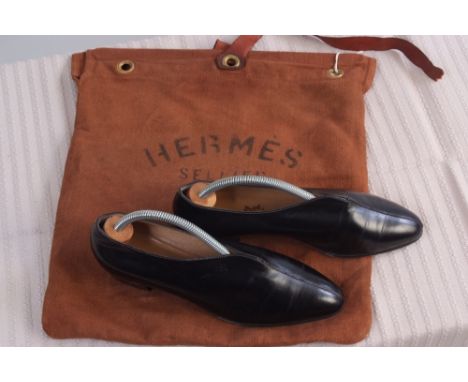 A Pair of black leather 'Hermes' Paris Shoes.  Very smart, leather shoes in a cotton Hermes bag. Size 37. (2) 