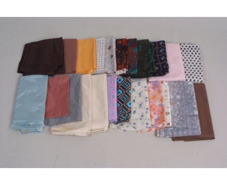 A collection of vintage silk dressmaking fabric to include Yves Saint Laurent and silk lining fabrics. QTY 