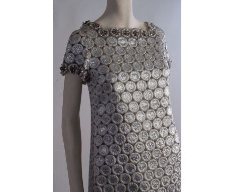 A 1960's Boutique 'Christian Dior' 51330 Cocktail Dress.  A classic 1960's shift dress, with pretty scalloped neckline and sl