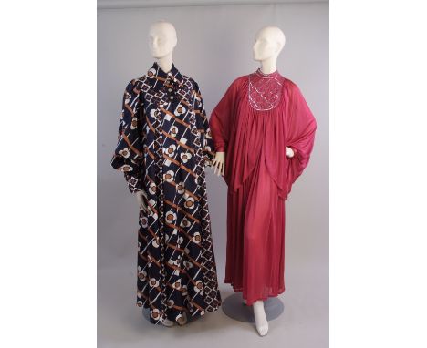 A 1970's Jean Varon Maxi Tent dress.  The dress is made from volumes of black sateen pleated at the front and back  with a bo