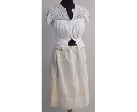 A quantity of vintage cotton camisoles and petticoats. To include a pretty cropped camisole top with lace petticoat. And a fu