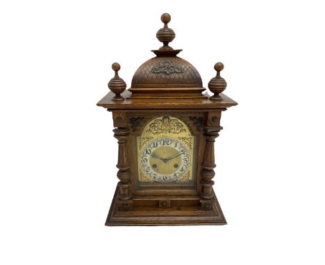 A German oak cased striking mantle clock manufactured by Junghans, Schramberg, Baden-Württemberg, c1900, flat topped pediment