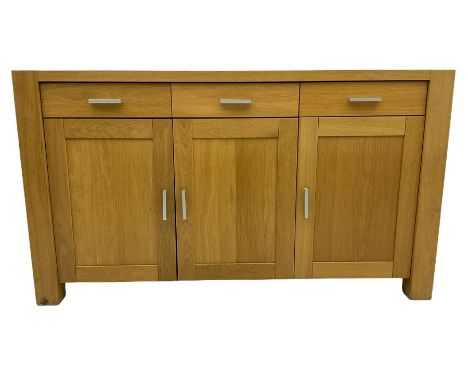 Light oak sideboard, fitted with three drawers and three cupboardsDimensions: Height:&nbsp;89cm&nbsp; Length/Width:&nbsp;156c