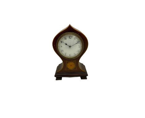 A small onion topped Edwardian boudoir clock in a waisted mahogany case with satinwood stringing to the edge and fan inlay, w