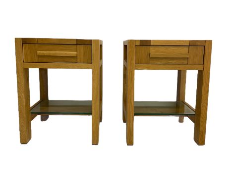 Pair of solid light oak lamp tables, fitted with single drawer and glass under-tierDimensions: Height:&nbsp;60cm&nbsp; Length