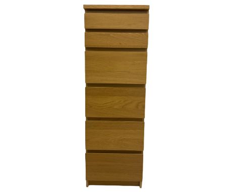 IKEA light oak finish chest, fitted with hinged vanity top, above six graduating drawers Dimensions: Height:&nbsp;123cm&nbsp;