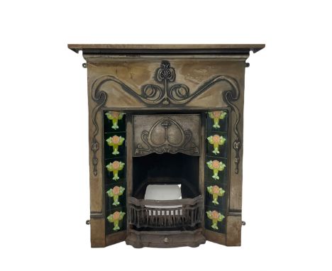 Art Nouveau style iron fireplace, cast floral detail, inset ceramic tilesDimensions: Height:&nbsp;114cm&nbsp; Length/Width:&n