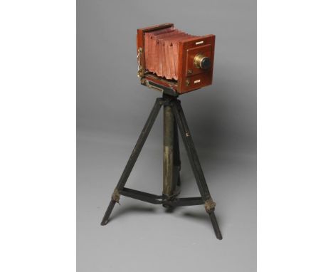 A J. LANCASTER & SON "THE INTERNATIONAL PATENT" HALF PLATE CAMERA, post 1887,  with J. Lancaster lens and folding tripod (Est