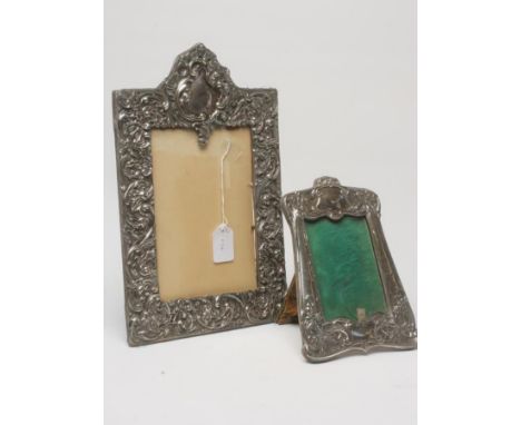 AN ART NOUVEAU SILVER PHOTOGRAPH FRAME, maker's mark H & A, Birmingham 1906, the easel back vertical shaped oblong frame stam