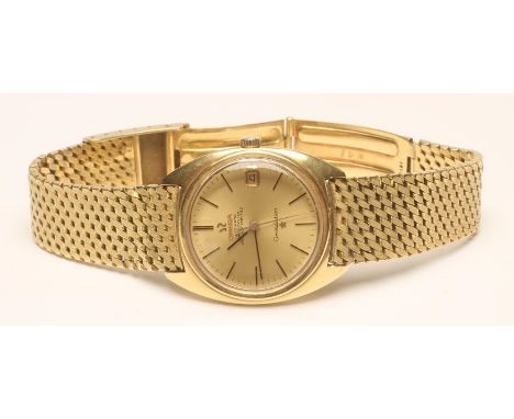 A GENTLEMAN'S 18CT GOLD OMEGA CONSTELLATION AUTOMATIC CHRONOMETER, the circular gilt dial with applied black line batons encl