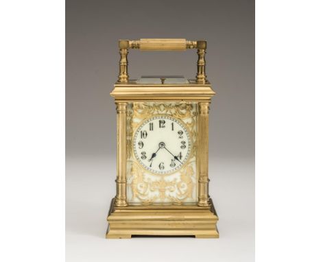 A BRASS CASED STRIKING AND REPEATER CARRIAGE CLOCK, the twin barrel movement with lever platform escapement striking on a gon