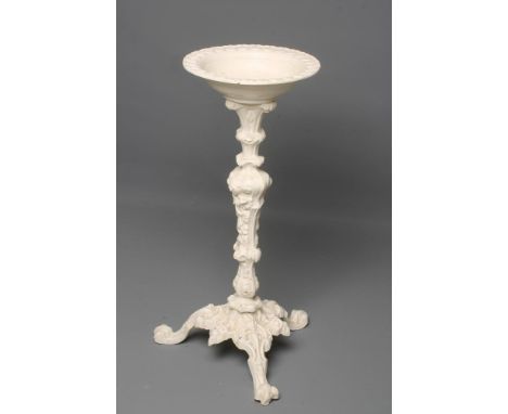 A VICTORIAN CAST IRON BIRD BATH, the circular bowl with leaf moulded rim, raised on foliate baluster stem, similar tripod bas