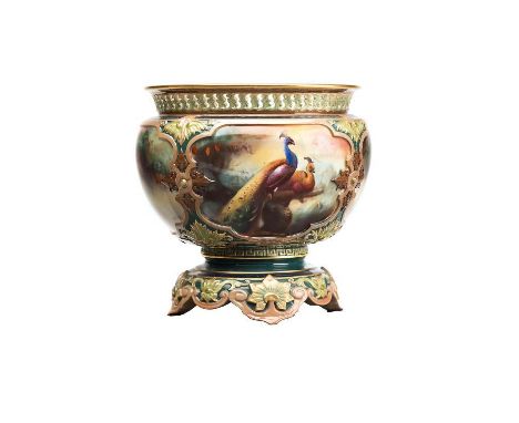 A ROYAL WORCESTER CHINA SMALL JARDINIERE, 1905, of circular form with four foliate strapwork moulded panels painted in polych