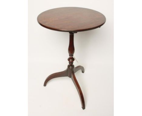 A GEORGIAN MAHOGANY WINE TABLE, c.1800, the circular snap top on baluster turned stem, tripod base with downcurved legs and b