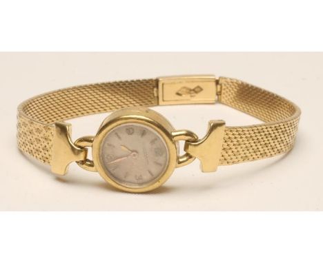 A LADY'S 18CT GOLD JAEGER LECOULTRE WRISTWATCH, the circular matt dial with applied metal Arabic numerals, back winding crown