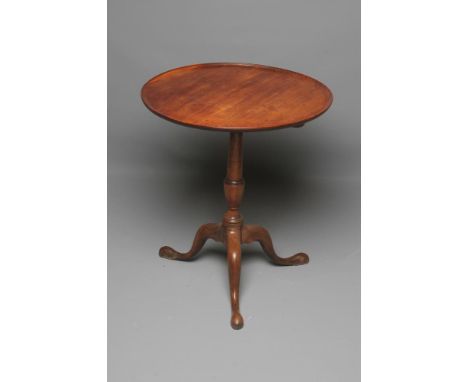 A GEORGIAN MAHOGANY TRIPOD TABLE, late 18th century, the dished circular snap top on turned vase stem, the base with cabriole