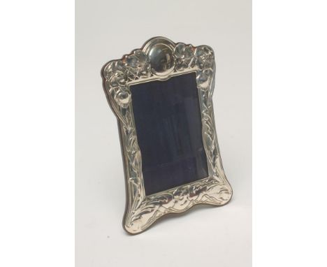 TWO ART NOUVEAU STYLE PHOTOGRAPH FRAMES, makers Carrs, Sheffield 2010, both of easel back vertical shaped oblong form stamped