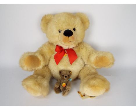 Steiff - two Steiff bears - lot includes a large teddy bear with a yellow tag on its ear and a small teddy bear with a yellow