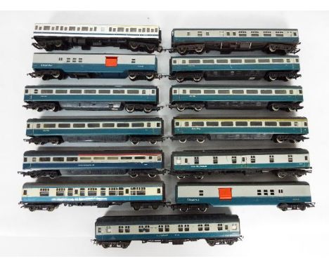 Triang, Hornby, Lima - A rake of 13 unboxed OO gauge mainly passenger coaches and freight rolling stock. Items include Triang