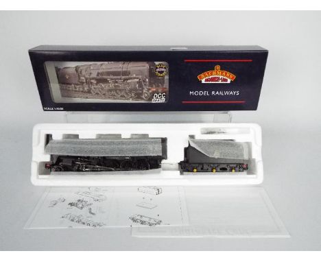 Bachmann - A boxed DCC Ready BR 2-10-0 9F standard operating number 92116 in black livery. The loco appears Mint in a Very Go