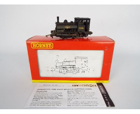 Hornby -  A boxed OO gauge BR 0-4-0 ST Class 0F Pug operating number 51235 in weathered finish. The loco appears Mint in a Go